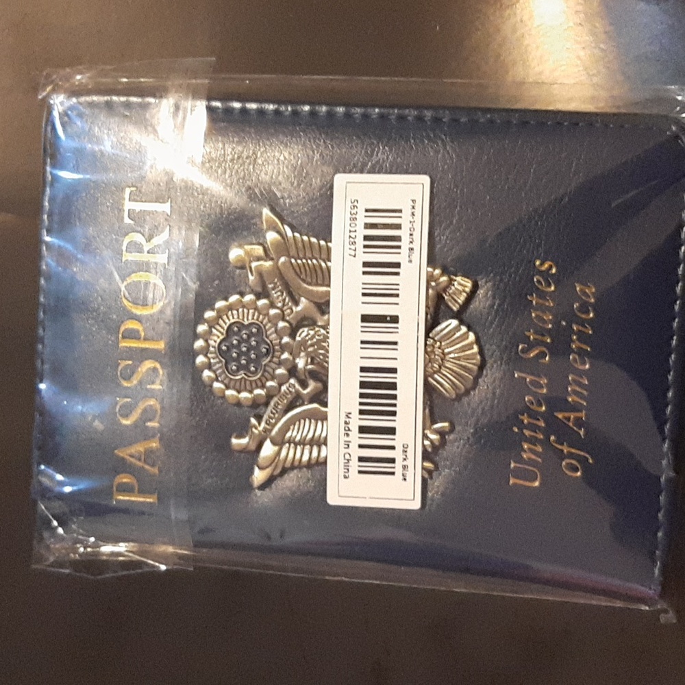 Passport Holder Case with Credit Card Slots and additional Compartments.